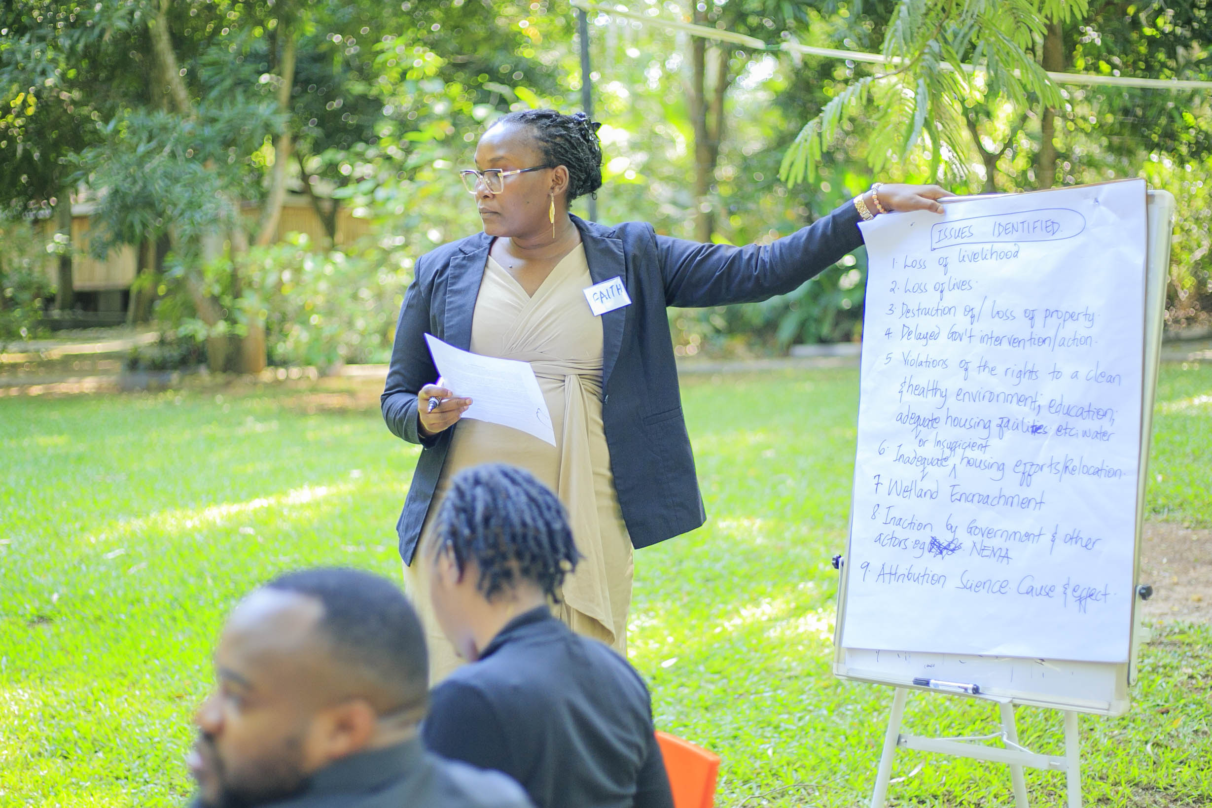 Participants discussing case scenarios during the breakout sessions on Day 1
